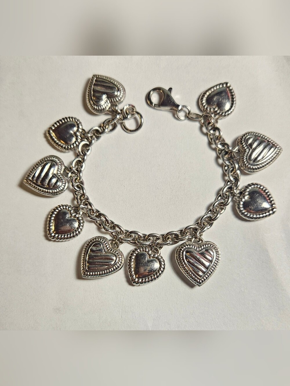 Vintage 'JCM' Jacmel MauritiusSterling Silver  Puffy Heart Charm Bracelet.
